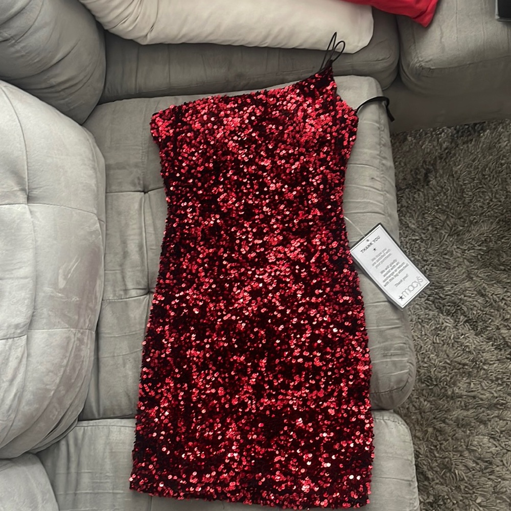 Sparkly red one shoulder mini dress
